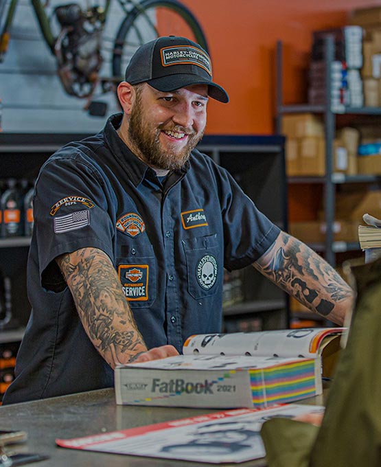 Guy working at a bike shop