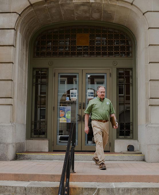 Man walking out of a building